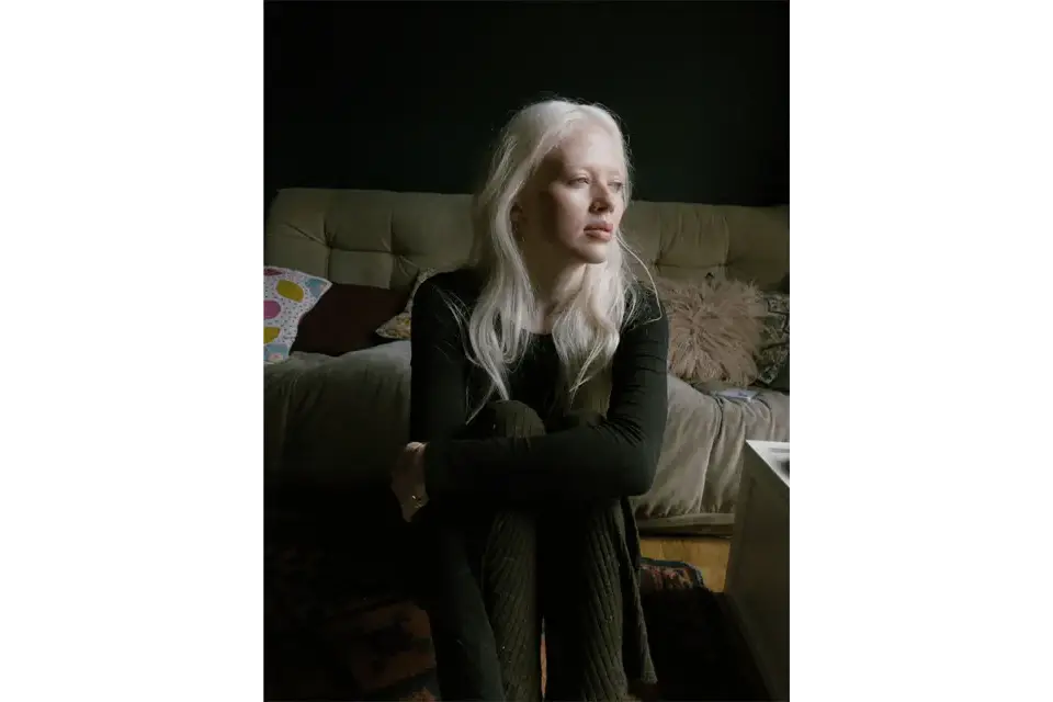 Portrait of a woman in her house