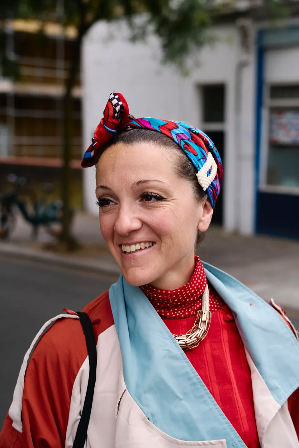 Shot by Mary McCartney showing a smiling woman.
