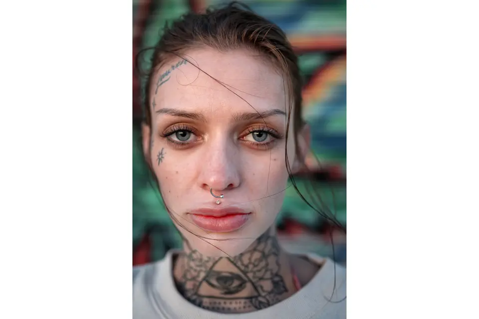 Portrait tattooed young woman