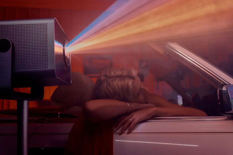 Woman in Car watches a movie