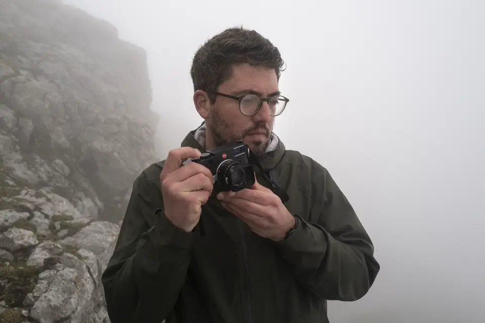 Photographer Dominic Nahr in a foggy landscape