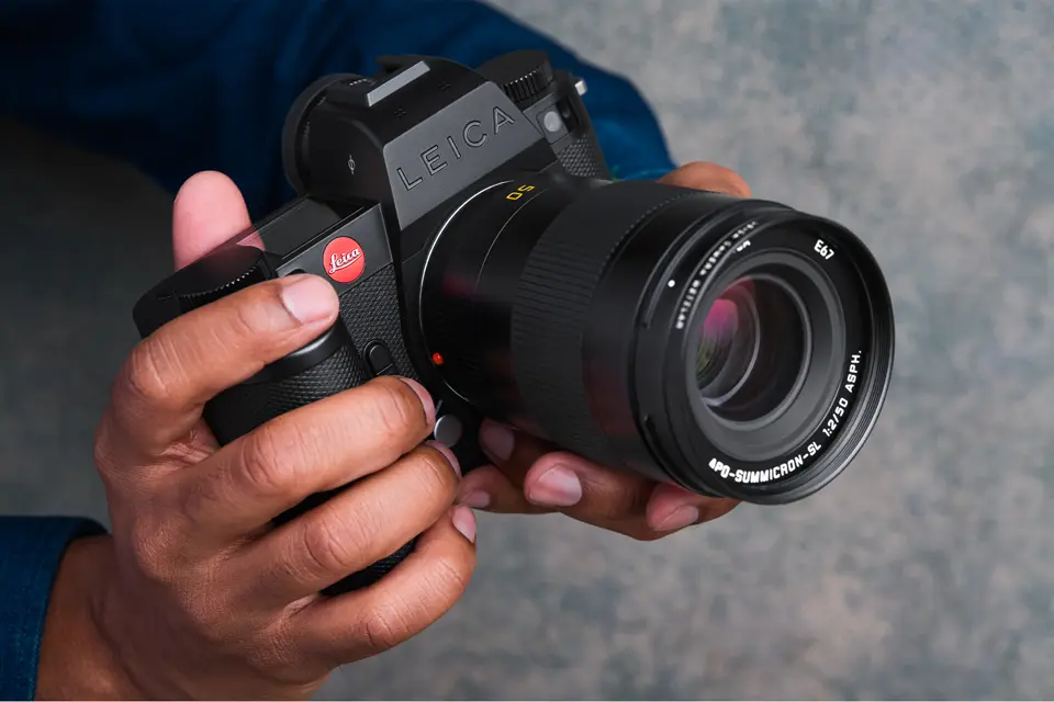 A person is holding the Leica SL3-S in their hands