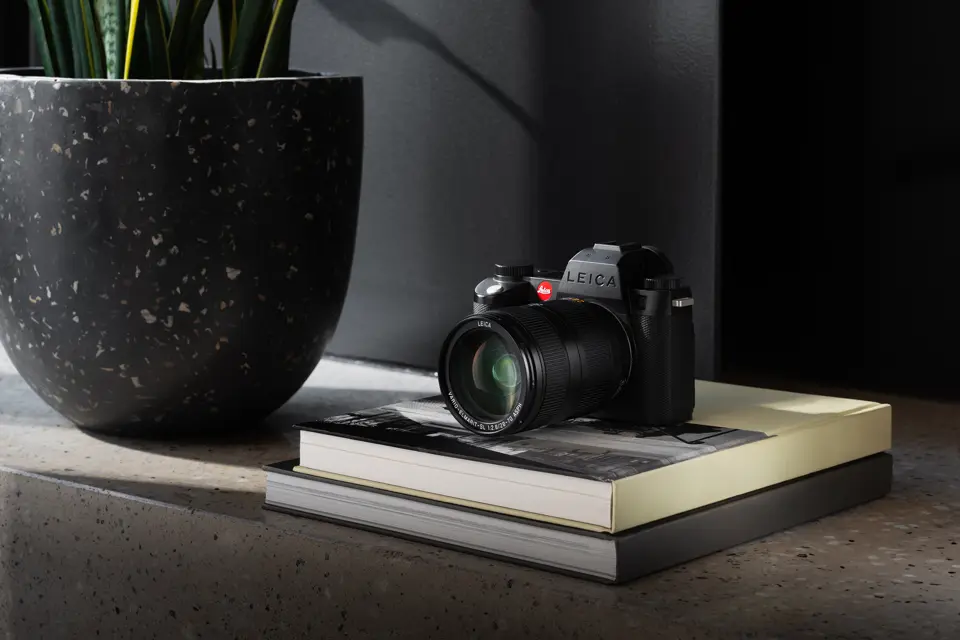 Leica SL3-S with Vario-Elmarit 28-70 f2.8 ASPH. lens on a cabinet