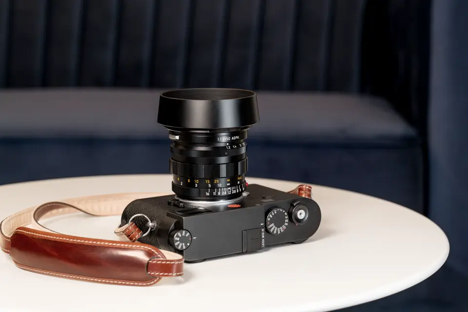 Leica M with an Noctilux lens on a table