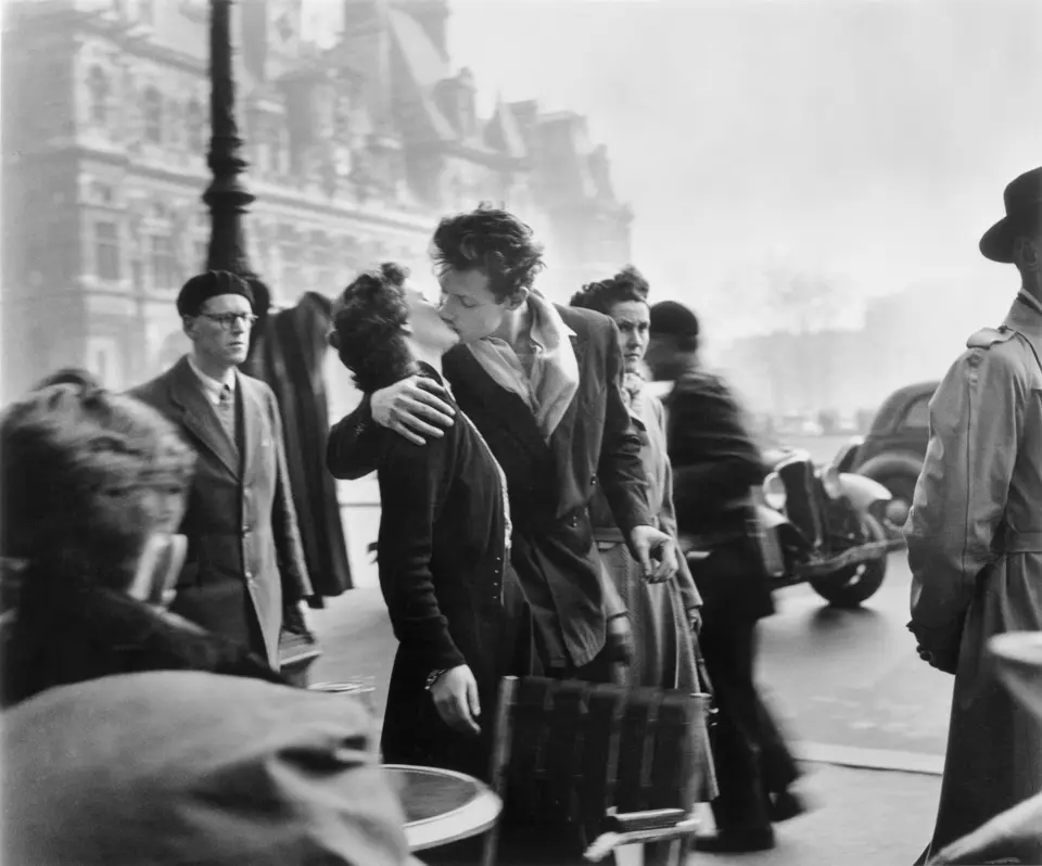 a couple kissing in Paris