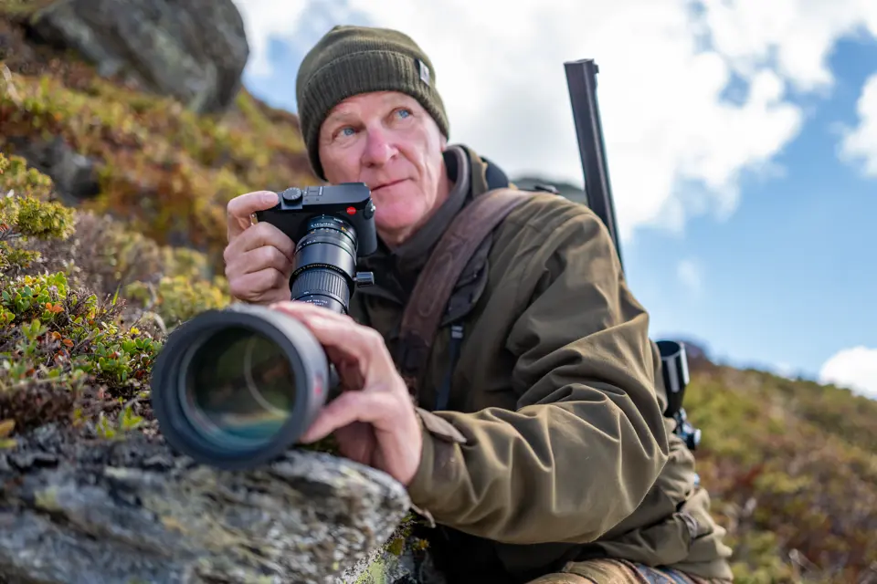 Man is digiscoping with his Televid spotting scope
