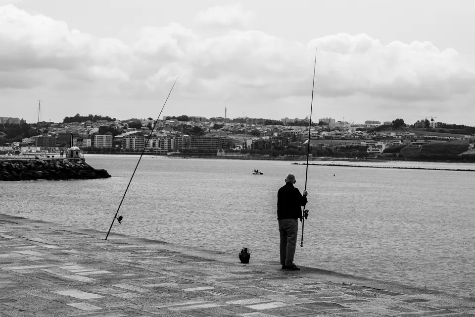 Man fishing in Porto
