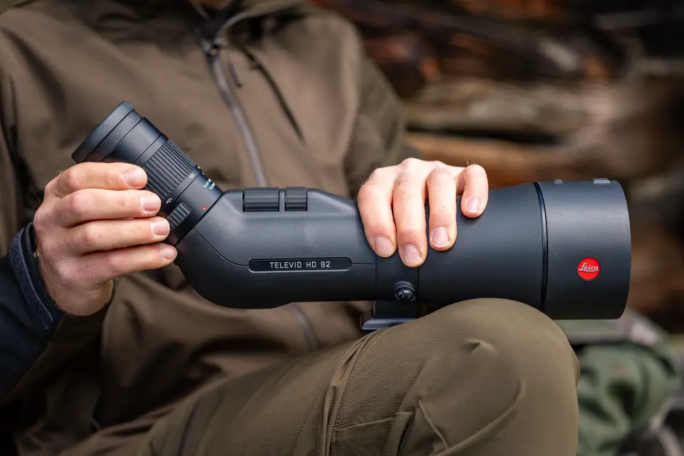 Man is showing his Leica Televid HD spotting scope