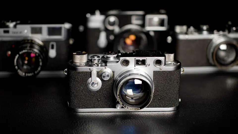 A group of Leica M cameras.