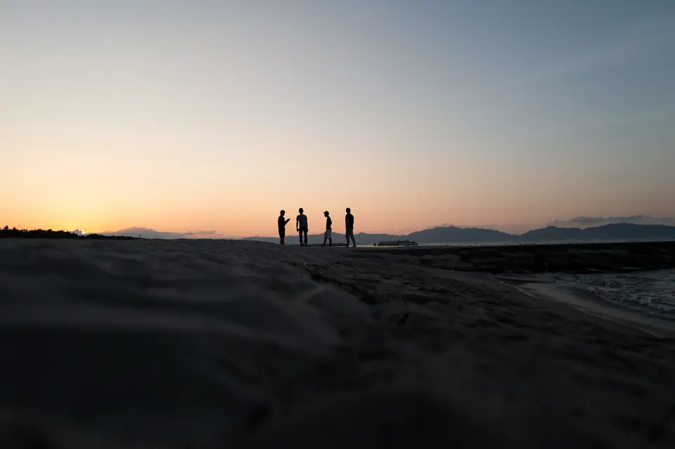 4 people at the beach