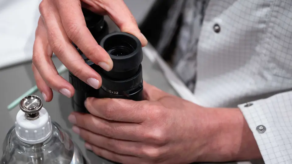 Colour photo of Leica Binoculars being serviced