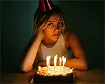 Women with a birthday cake