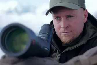 Man holding his Leica Televid HD spotting scope