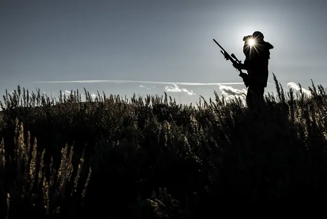Hunter against the sunset