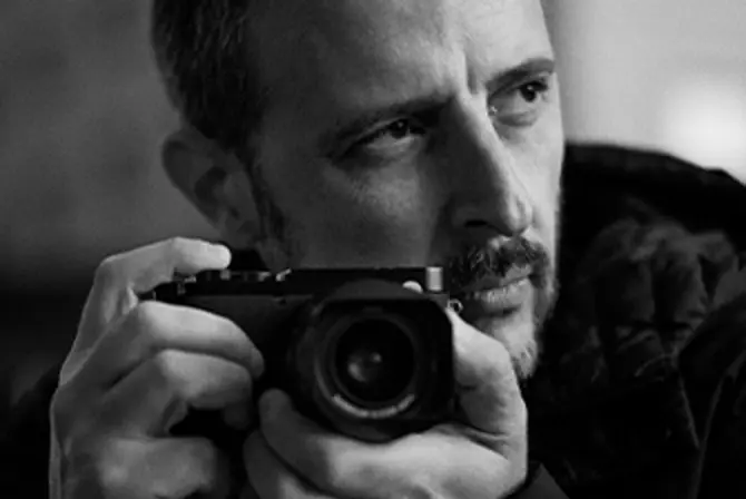 Portrait of Eolo Perfido with camera in hands