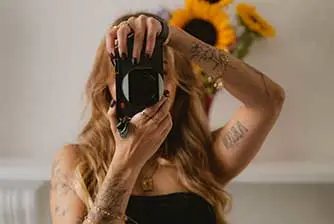 Colour portrait of Sophie holding a Q3 43