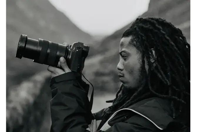 Black and white image of Henry Jay Kamara with SL3-S