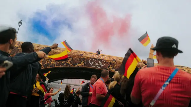 People celebrating Olympia on the street.