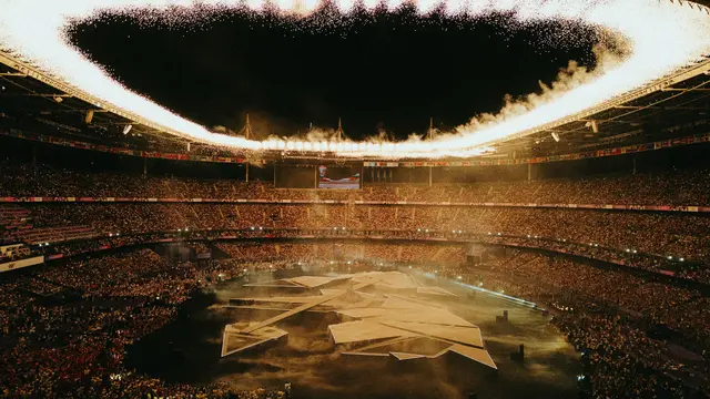 Olympia stadium bathed in light.