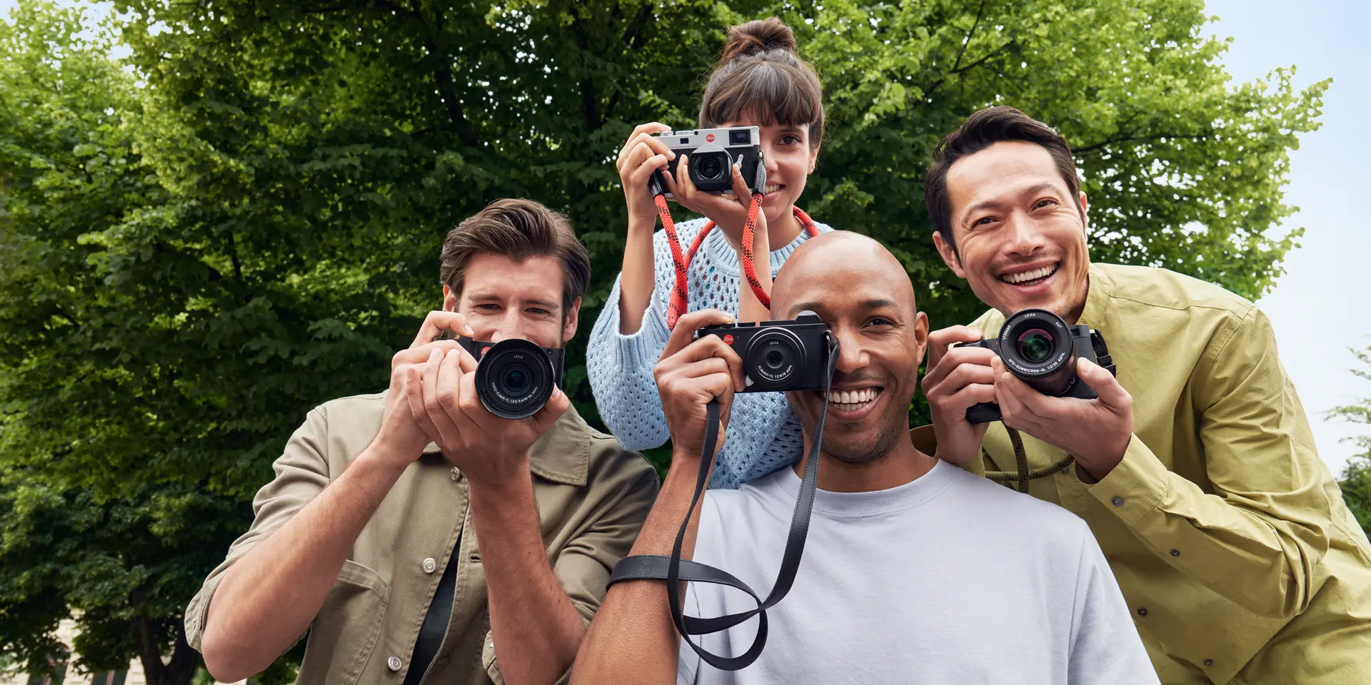 Group of people with leica cameras