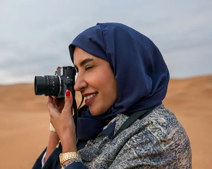 Woman with a Leica M11-Monochrom in the desert
