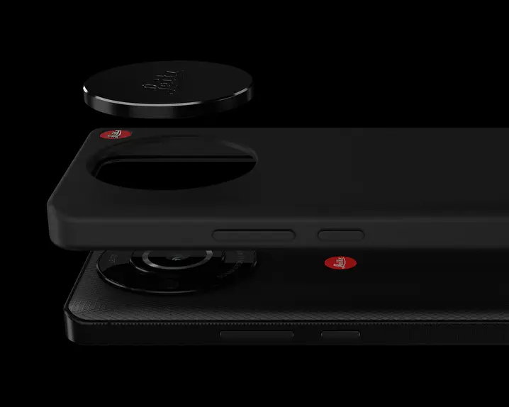Components of the Leitz smartphone, such as the device and camera case, float above each other.