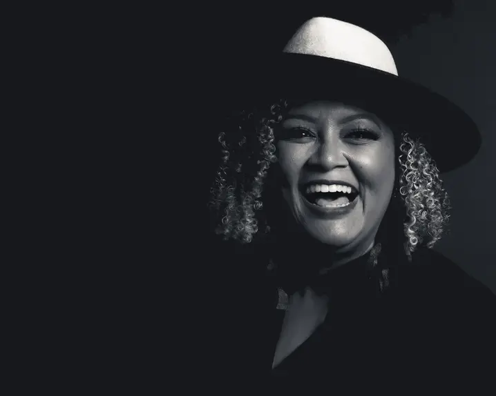Portrait of a smiling woman wearing a hat
