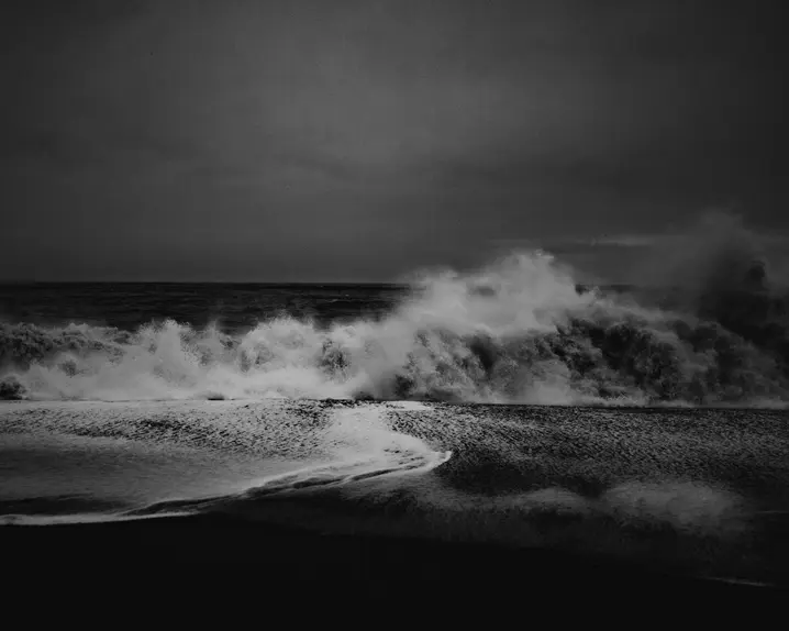 Black and white photo of turbulent waves