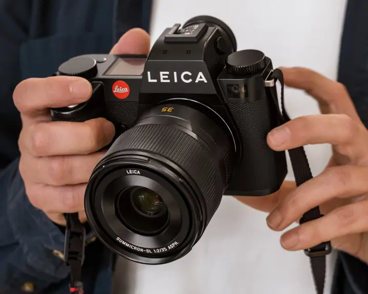 Man holding a camera in his hands