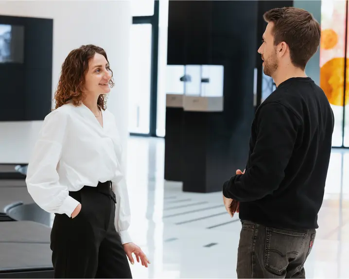 Two Leica employees
