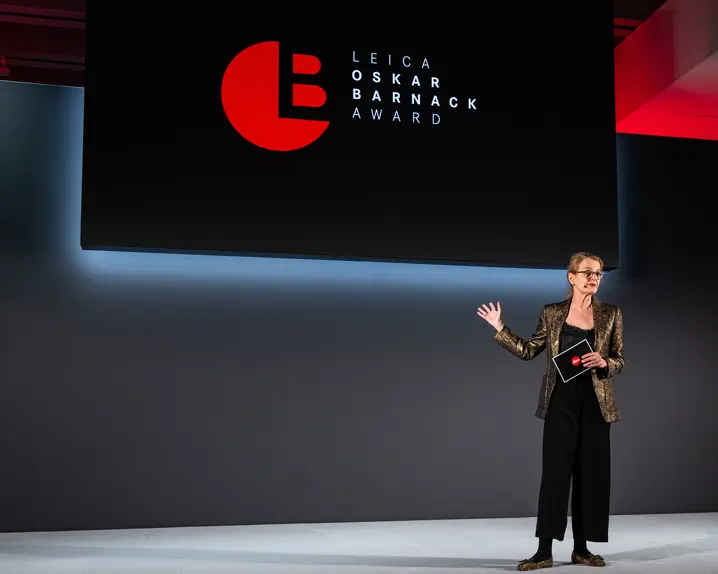 Karin Rehn-Kaufmann on stage of the Leica Oskar Barnack Award.