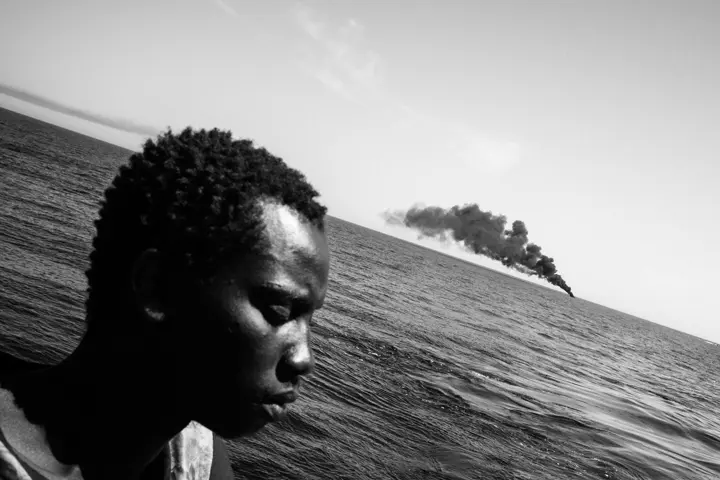 Migrant in a lifeboat on the high seas