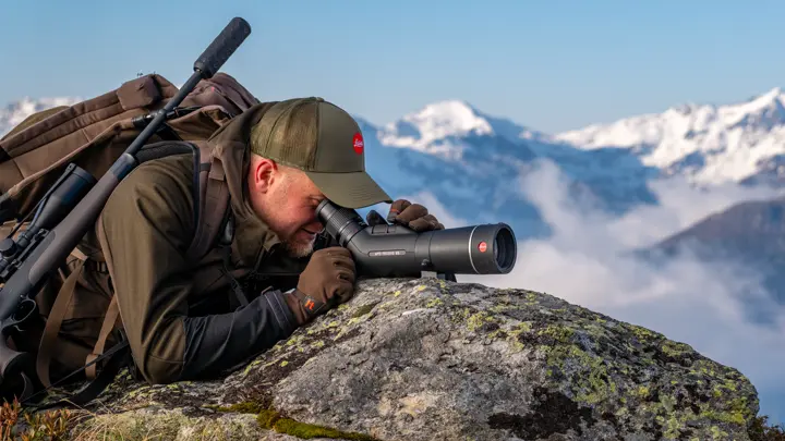 Man-is-looking-through-his-Leica-Televid-HD-spotting-scope