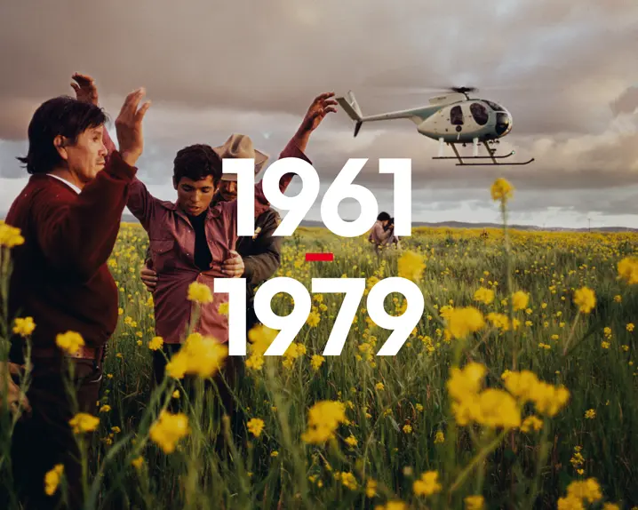 Attack in the flower field, helicopter in the sky - 1961 - 1979 in foreground 