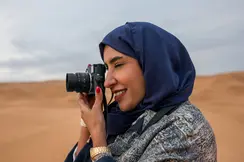 Woman with a Leica M11-Monochrom in the desert