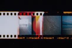 Photographed filmstrip with different images of water and a woman at the sea