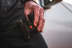 Leica-compact-binoculars-held-by-a-man