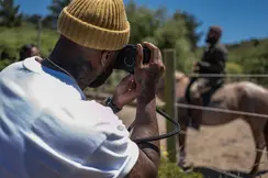 Brandon Ruffin photographs a horse with a Leica Camera
