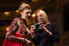 Xiomara Bender and a dancer look at their pictures on the Leica SL3 together.