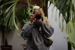 Image of Holly-Marie photographing with the Leica SL3-s