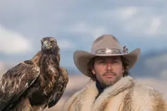 Photographer Diego Rodriguez with a falcon on his arm