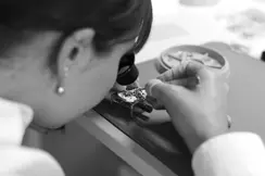 A woman assembling a Leica watch