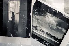 Black-and-white film negatives covered with water droplets.