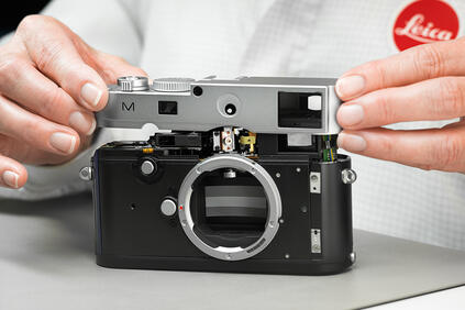 Man repairs a Leica M Camera