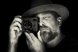 Close-up of a man taking a picture. 