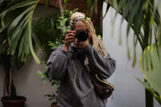 Image of Holly-Marie photographing with the Leica SL3-s