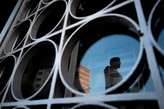 Reflection of a man in a building