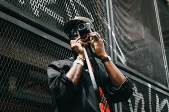 Alex Dobé is taking a picture