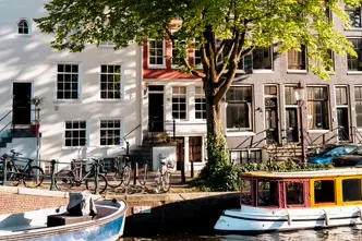 Colour image of a canal in Amsterdam