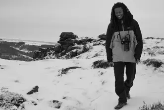 Black and White photo Of Henry Jay Kamara with the SL3-S.
